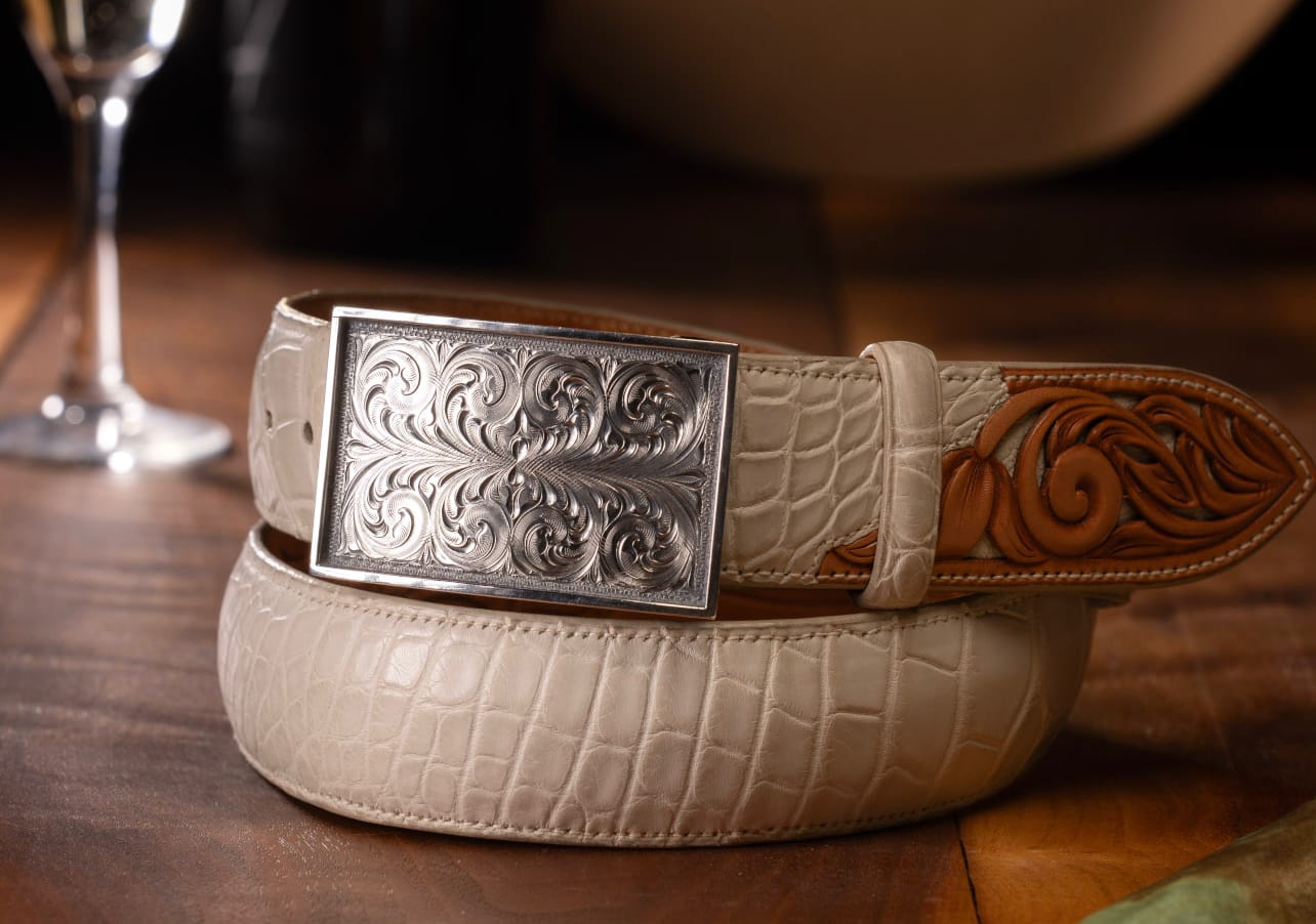 Zapata 1813 trophy buckle on white leather belt strap
