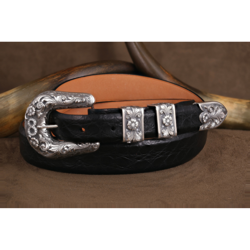 Rhinestone Cowboy: Clint Orms's Custom Belt Buckles a Work of Art